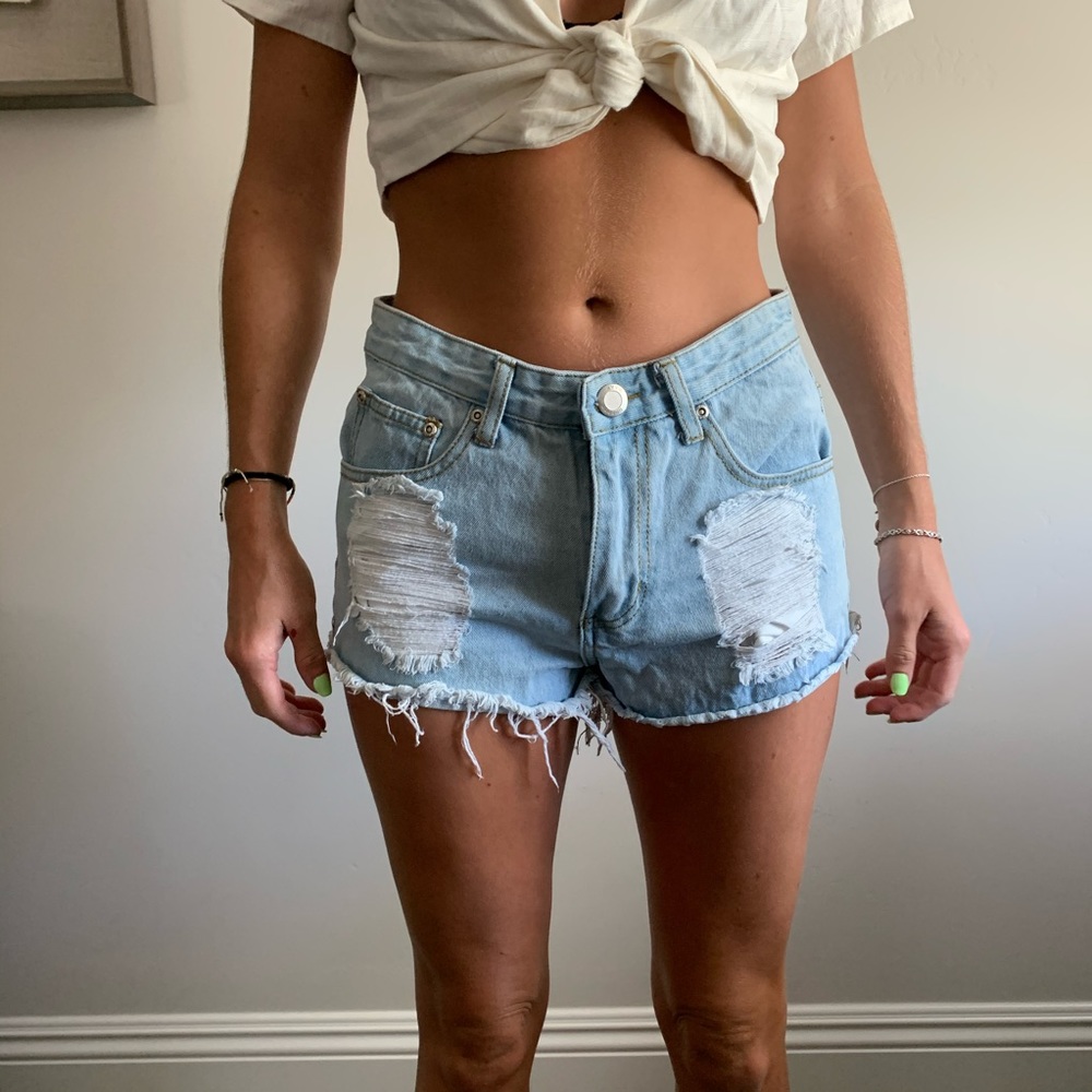 distressed light denim short